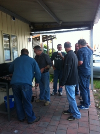 How many men does it take to cook a BBQ???